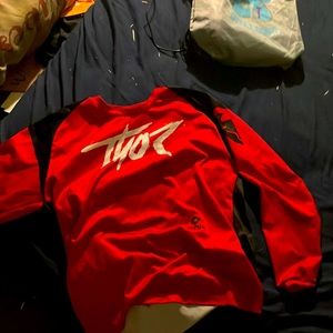 A red and black Thor riding shirt for women or men, children’s or adults
